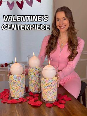 DIY VALENTINE’S CENTERPIECE 🕯️💘 Here’s an easy decor idea to put together for V-day!  🔗Shop the video on my LTK & Amazon. SUPPLIES: -Vases -Sweet Tart heart candies -Candles *Optional: Glasses to put inside vases for fillers if you don’t want to buy so much candy- I ended up doing this! DIRECTIONS: 1. Insert glasses inside vases upside down to fill space. 2. Pour Sweet Tart candy over top- until vase is about 75% full. 3. Add candles on top. 4. Set out as a beautiful centerpiece for Valentine’s Day! #valentines #ValentinesDay #valentinesdaydecor #valentinesdecor #vday #vdaydecor #valentinescenterpiece #vdayideas #valentinesdecorations #valentinesideas #vday2025 #valentines2025 #valentinesdiy #diyvalentines #diyvalentinesdecor 