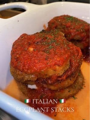 Italian Eggplant Parmigiana Stacks — Are you looking for a delicious eggplant recipe idea!? You can serve these stacks on their own or bake in the oven with fresh pomodoro sauce and Italian cheese. This is the perfect meal idea for any Sunday dinner! 🇮🇹🍅🫒  #italianrecipe #italianfood #italiandinner #italiancheck #eggplantrecipe #italiancooking #italiandinnerideas #eggplant 