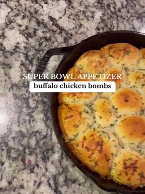 ultimate super bowl app 🏈 still obsessed with these buffalo chicken bombs! p.s.  I used rotisserie chicken to make it even faster (about 2 cups) ingredients + instructions combine: 2 shredded chicken breasts cooked (I like to just use rotisserie chicken!)  2/3 cup Cream cheese 1/3 cup ranch (yes, you can sub bleu cheese for ranch 🙄) 1/3 cup Buffalo sauce (Frank’s red hot is my fav!) 1 cup Mozzarella cheese MIX grease cast iron pan cut 8 biscuits in half (I like the @pillsbury grands flaky biscuits) flatten out each half and stuff with a little chicken filling pinch in sides to make a ball repeat until all 16 bombs are done! cook at 375° for 25 mins total — pulling out after 10 mins to top with: melted butter, dried parsley, garlic and parmesan cheese ENJOY!! * I always have leftover filling that I just eat as a dip or even use for a sandwich the next day! If you want to use it all at once — I’d recommend buying 2 cans of biscuits.  #quickdinner #quickandeasyfood #buffalochicken #fastdinner #buffalochickendip #yummydinner #chickenbiscuit #simplerecipe #superbowlfood #SuperBowl 