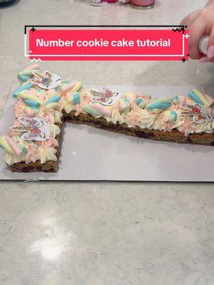 Number 7 cookie cake tutorial 💕💜🦄  #numbercaketutorial #numbercake #cookiecake #baking #chocolatechipcookie #buttercreamcakedecorating #cookiecakedecorating #bakingforbeginners #howtodecorateacake #cookiedecoratingvideos #pink #unicorn 