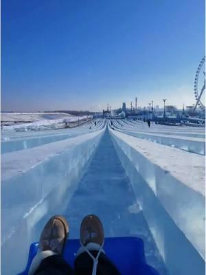 Tag ur friend who u think can take on this super ice slide! The #Haerbin #IceandSnowWorld slide features the longest track, stretching 521 meters! @visit.heilongjiang #chinatravel #winter #icesculpture #springfestival #tiktokisback 