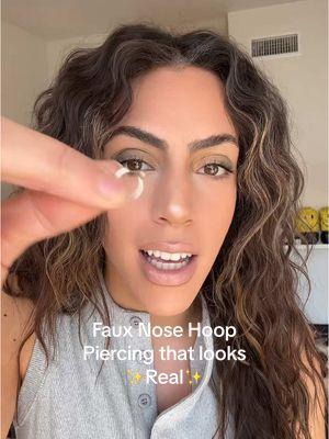 No more unnecessary piercing bumps! This fake nose ring piercing that looks real is so much easier than going to get it pierced! @Pierce and Tat  #nosering #fauxnosering #noseringhoop #nosehoops #fauxpiercing #nosepiercing #hoopnosering #goldiewelry #tiktokshopfinds #tiktokshopmademebuyit #tiktokmademebuyit #newyearnewaura #tiktokshopmusthaves #tiktokshopjumpstartsale #tiktokshoploveatfirstfind 