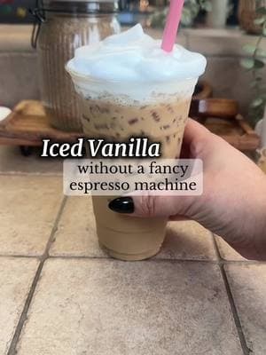 No espresso machine? No problem! ☕✨ Here’s how to make an iced vanilla latte at home—so easy and just as delicious!  Ingredients: 	•	1 tbsp Nescafé instant espresso 	•	2 oz cool water (to dissolve the espresso) 	•	1-2 tbsp Torani Sugar-Free Vanilla Syrup (adjust to taste) 	•	1 cup milk (dairy or non-dairy) 	•	Ice cubes #creatorsearchinsights #icedlatte#vanillalatte#coffeeathome#icedcoffee#tiktokcoffee#coffeetiktok 