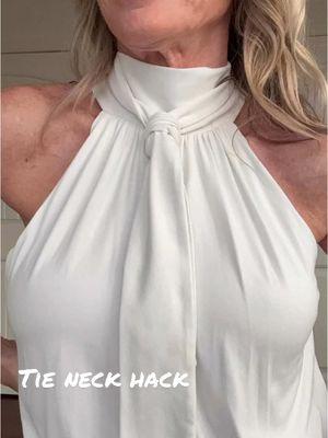 How to tie a halter top for a polished look.  Throw a blazer on for the office and take it off for happy hour!  What do you think?  #TimelessElegance #MidlifeStyleInspo #ChicAndClassic #AgelessFashion #TSCityChic #MidlifeStyle #EffortlessChic #ClassicStyle #tacitychic #halterhack #tienecktop 