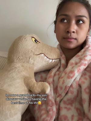 Handed me his dinosaur so he can start playing😂😭.i guess im now a dino grandma 😂😂😂#kidtiktok #fyp #mom 