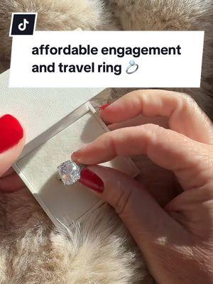 No need to go in debt for a ring when rings like this exist! This won’t turn your finger green and is sterling silver. This engagement travel ring is stunning!! ✨💍 #engagementring #isaidyes #isaidyes #imengaged #weddingtok #dreamring #dreamwedding #engagementideas