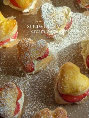 Heart-Shaped Strawberry Cream Puffs Recipe 🍓 Ingredients: 8 oz heavy whipping cream 3 tbsp granulated sugar 1 tbsp vanilla bean paste 1 cup strawberries, washed and sliced 1 box puff pastry 1 tbsp powdered sugar for dusting (optional) For the Egg Wash: 1 egg 2 tbsp water Method: 1. Preheat Oven: Preheat oven to the temperature required by your puff pastry packaging (usually around 400°F/200°C). 2. Prepare Cream Filling: In a bowl, add the heavy cream, vanilla bean paste, and granulated sugar. Mix on high for 3-5 minutes until stiff peaks form in the cream. 3. Chill Cream Filling: Add the cream to a piping bag and refrigerate until ready to use. 4. Cut Out Puff Pastry: Cut out heart-shaped puff pastry pieces, or slice them into even rectangles. 5. Prepare Egg Wash: Whisk together the egg and water to create an egg wash. 6. Brush Egg Wash: Brush the egg wash over the puff pastry pieces to give them a golden brown finish. 7. Bake Puff Pastry: Bake the puff pastry pieces according to the package instructions (usually around 12-15minutes, or until golden brown). 8. Assemble Cream Puffs: Allow the puff pastry to cool completely. Open from center, Then, pipe the chilled cream filling onto one half of the puff pastry piece. 9. Add Sliced Strawberries: Top the cream filling with sliced strawberries. Close the puff pastry. 10. Dust with Powdered Sugar (Optional)*: Dust the top of the cream puff with powdered sugar, if desired. 11. Serve and Enjoy: Serve immediately and enjoy! Tips: - Make sure to chill the cream filling thoroughly to prevent it from melting during assembly. - Use high-quality puff pastry for the best results. - Don't overfill the cream puffs, as they can become too messy. - Experiment with different flavors, like adding a hint of cinnamon or nutmeg to the cream filling. #strawberry #creampuffs #puffpastry #EasyRecipe #easydessert #Recipe 