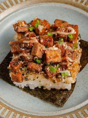 TOFU MUSUBI BAKE - the perfect easy to make weeknight dinner the whole family will love. Find the full recipe now live on the Sweet Simple Vegan blog or in mine or @Jasmine Briones bio. Flavor packed tofu layered on top of sushi rice, furikake, and drizzled with some egg-free kewpie mayo. #vegan #musubi #dinner #entree #Recipe #EasyRecipe #tofu