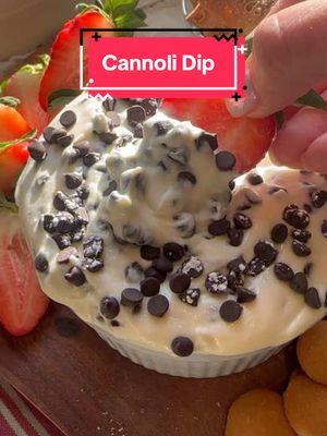 Cannoli Dip (Serves 6 to 8) Ingredients 1 ½ Cups Ricotta, pat dry any excess water with a paper towel 8 oz. Mascarpone 1 ½ Cups Powdered Sugar, plus extra to top the dip with 2 tsp. Vanilla Extract ⅛ tsp. Almond Extract 1 Cup Mini Chocolate Chips, plus 2 tbsp to top the dip with  Cannoli Shells Pieces, Strawberries (halved), Chocolate Chip Cookies, Graham Crackers or any other dippers you would like. Method In a stand mixer (or you can use a hand mixer) fitted with a whisk attachment, add in all the ingredients except the chocolate chips and whip until well combined and creamy.  Fold in the mini chocolate chips. Top with more chips and a dusting of powdered sugar.  Store in the refrigerator until ready to serve. PLEASE NOTE: This can be made up to 3 days in advance. #cannoli #dessert #desserts #easydessert #partyfood #cooking #nobakedessert 