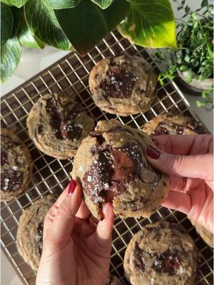 My all time favorite salted chocolate chip cookies✨ Thank you @square culinary team for this recipe! ▪️2+3/4 Cups All Purpose Flour ▪️1 tsp Baking Powder▪️2 tsp Kosher Salt (I recommend Diamond Crystal)▪️1 Cup Butter, slightly softened▪️1 Cup Dark Brown Sugar, packed▪️1/2 Cup Sugar▪️2 Eggs▪️1 Tbsp Vanilla Extract▪️14 oz. (4 Bars) High Qual Dark Chocolate (I use 72% - 78% dark), roughly chopped▪️Maldon Sea Salt▪️ 1️⃣ Preheat the oven to 350°F. 2️⃣ Sift (or mix) flour, baking powder, and salt together. 3️⃣ In a separate bowl, beat together butter (slightly softened), brown sugar, and granulated sugar for 2-3 minutes. 4️⃣ Beat in eggs and vanilla, and then scrape down the bowl. 5️⃣ Gradually add flour mixture to the butter mixture, and beat until well blended. 6️⃣ Roughly chop the chocolate and then add to the cookie dough, stir to combine. 7️⃣ With a heaping 2 oz. scoop, drop cookies onto parchment paper lined sheet pans 3 inches apart to give room for expansion. Work in batches if needed, making sure not to overcrowd the pans. 8️⃣ Top each cookie dough ball with a pinch of Maldon sea salt. 9️⃣ Bake cookies for 12-14 minutes or until golden brown on the edges. Enjoy! ⏲️ 20 minute prep time + 15 minute cook time Recipe makes 28 cookies For all recipes delivered to your inbox weekly (with printable PDFs) + access to the searchable recipe archive, subscribe to my newsletter via the link in my bio 😘 . #maxiskitchen #recipesoftikok #chocolatechipcookies #cookiesoftiktok #easydesserts 