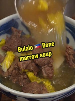 Warm up with a hot bowl of Bulalo. This is a 🇵🇭 bone marrow soup that is the exact type of home cooking my body needs to get through this cold spell we got going on in NYC. Some times I like to eat it with noodle 🤫 Please see my recipe below: 2.5lbs beef shanks  6C water  2tbs sugar (more to taste)  1tbs salt (more to taste) 1/4C fish sauce Black pepper to taste 1/2 large onion medium diced 1 ear corn  6 pieces baby bok choy  1.5C cabbage  Garnish: Crispy garlic  bean thread noodles (rehydrated in hot water)                                                   #bonemarrow #bulalo #filipinorecipe #sarap #noodles 