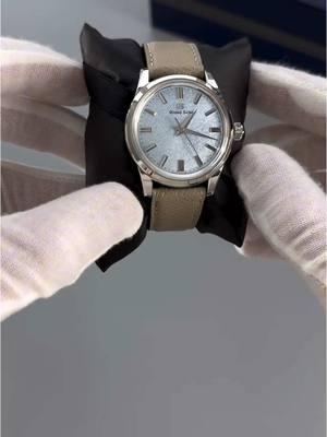 Unboxing a beautiful Grand Seiko.💎 Timeless elegance meets nature’s artistry: The Grand Seiko Men’s SBGW283G, also known as the ‘Iwate Sky,’ draws inspiration from the serene blue skies over Mount Iwate. With a 37.3mm stainless steel case and a slim 11.7mm profile, this manual-wind masterpiece captures the essence of subtle sophistication. #chrono24 #watchlove #grandseiko #sbgw283 #edutok #fyp #watchfam #unboxing 