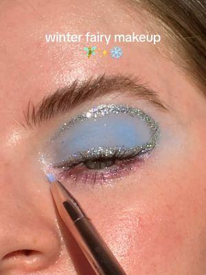 Love the pastel blue with the glitters hehe✨❄️  @Trixie Cosmetics snow bunny palette  @ColourPop Cosmetics creme gel liner shade Kicker @Half Magic GlitterPill shades pretty puddle, microcosm and sweet prince ✨ #makeuptutorial #glittereyeliner #oneswipeliner #duochromemakeup #holographiceyeliner #pasteleyeshadow #trixiecosmetics #wintereyeshadow #winterfairymakeup #creatorsearchinsights 