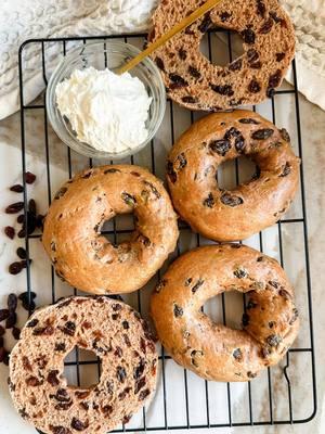 PROTEIN CINNAMON RAISIN BAGELS- because if you’re craving bagels non-stop (like me) then finding ways to sneak in a lil extra protein is KEY. If you’re needed a quick and easy meal prep for the week then you gotta give these a try. I just pop mine in the air fryer (or toaster if you have one of those) and slather on some cream cheese and some turkey bacon. I eat it with some fresh fruit and I have like ultimate gourmet breakfast for four days in a row. It’s a dream come true LOL. Hit that SAVE button, SHARE with someone you want to make these with, and TAG me when you do!! * 1 + 1/2 cups all-purpose * 2 tsp baking powder * 1/2 tsp salt * 1 cup plain greek yogurt * 2 Tbsp coconut sugar * 1 Tbsp cinnamon * 1 cup dried raisins * 1 egg for egg wash (whisked egg) 1. Preheat your oven to 350°F and line a baking sheet with parchment paper or a silicone baking mat. 2. In a small mixing bowl, combine the flour, baking powder, salt, ground cinnamon, and coconut sugar. Whisk until evenly combined. 3. Place Greek yogurt in a large mixing bowl and add flour mixture on top. Mix with a rubber spatula until a dough forms. Use your hands to knead the dough in the bowl for a minute or two until it’s smooth and pliable. (dough will be sticky, that’s ok- just flour your hands to make the dough workable) 4. Fold in the raisins, kneading gently to evenly distribute them throughout the dough. 5. Roll the dough into a large ball and cut into four equal portions. Roll each portion into a log, about 8 inches long, then connect the two ends to form a bagel shape. 6. Place the bagels on the prepared baking sheet. Brush each one with egg wash (or a light coating of oil) to create a golden brown finish during baking. 7. Bake the bagels in the preheated oven for 25–28 minutes, or until golden brown and firm to the touch. 8. Let the bagels cool slightly on the baking sheet before serving. Enjoy warm or toasted with cream cheese! #healthyrecipes #cinnamonraisin #cinnamonraisinbagel #proteinrecipes #healthybagels