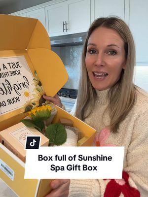 This adorable spa gift box is filled with the sweetest gifts! It would be a great gift for birthdays, Mother’s Day, etc. #spagiftbox #giftsformom #giftsforher #mothersdaygiftideas #getwellsoongift #boxofsunshine #wifegift 