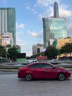 At the fountain in Ho Chi Minh City in Vietnam. #Saigon #HoChiMinhCity #Vietnam #Vietnamese #Dogs #Fountain #Street #Cars #Downtown #City