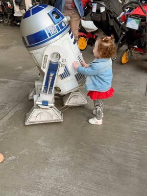 She likes the Disney princesses but LOVES the droids! @Disney Parks #disneyland #starwarsfamily #galaxysedge #r2d2 