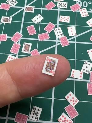 Sometimes miniatures are SO TINY. I love them now that they’re cut out, but I really hated cutting these out. #miniatures #miniatureart #miniaturist #artistoftiktok #artist #cards #playingcards #dollhouse #dailymini #dollhouseminiatures 