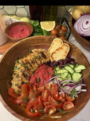 Mediterranean chicken bowl with homemade beetroot hummus🌿🍅🥒 recipe below: Pink Beetroot Hummus: -4.5 oz chickpeas, drained  -3 small cooked beets (130g) -3 small garlic cloves -juice from 1 lemon (about 2 tbsp) -1 tbsp tahini  -1 tbsp olive oil -1/4 tsp ground cumin -salt & pepper -combine in a food processor until smooth. Refrigerate for at least 30 mins. Makes 3 1/4 cup servings Mediterranean Chicken marinade: -2 tbsp plain Greek yogurt  -1 tsp dill -2 tbsp parsley  -3 Large basil leaves -juice from 1/2 lemon (about 1 tbsp) -1 tsp olive oil -1/4 tsp paprika  -1/4 tsp oregano  -1/4 tsp salt -1/4 tsp pepper -recipe is for 1 large chicken breast. Marinate for at least 30 minutes. Cook in olive oil spray until an internal temp of 165 degrees F is reached.  Assemble: Serve cooked chicken with hummus, pita, tomatoes, red onion, cucumbers, kalmata olives & roasted red peppers. Top with basil, dill & lemon juice #mediterranean #mediterraneanfood #EasyRecipe #fyp #DinnerIdeas #healthy #healthyrecipes #easyrecipesathome #chicken #chickenrecipe #lunchideas #healthyfood #cooking #hummus #fory #mealideas #highprotein #highproteinmeals  #creatorsearchinsights 