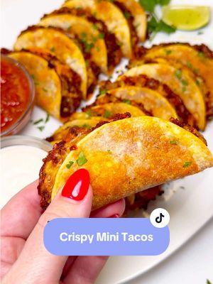 Crispy Mini Tacos 🌮 Simple, crispy and delicious and perfect for game day!✨ #Tacos #GameDayRecipe #MiniTacos #CrispyMiniTacos Crispy Mini Tacos 🌮  Makes 12 Ingredients: 1lb meat of choice (you can use ground beef with taco seasoning, pork chorizo or shredded chicken) 12 street size corn tortillas 8oz Mexican shredded cheese  1 cup salsa 1 cup sour cream Cilantro for garnish Directions: Cook your meat of choice and set aside. Spray a foil lined sheet pan with oil then lay on your corn tortillas. Add meat and top with shredded cheese. Bake in a 425°F oven for 2 minutes until cheese has just melted. Fold tortillas in half and return to oven for 12 more minutes or until tortillas are crispy. Serve with salsa and sour cream. Garnish with cilantro. Enjoy!