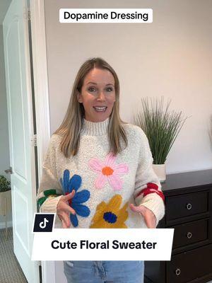 This floral sweater is so bright and cheery! #cutesweaters #dopaminedressing #cuteoutfits #momoutfits #floralsweater #flowersweater #teacheroutfit 