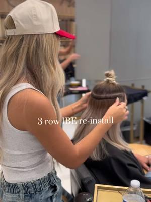 3 row IBE re-install let's talk about it👇🏼👇🏼 My clients main concern when she first came to me were how fine her hair has gotten after overcoming an illness, so she wears 3 rows (2 full rows + a nape row) for fullness & thickness. lots of people think length with extensions but that's not always the case! I love how customizable IBE extensions are.  We actually first started out with 1 row (3 wefts) + a nape row (1 weft) but this time she wanted extra thickness so we added a row (3 wefts) Instead of adding wefts to her first row we decided to add a row so that there's less weight distribution on each row for the healthiest install possible so she can still grow her hair while wearing extensions (BC W/ IBE ITS POSSIBLE) ;)😇 #hairextensions  #ibe #hairstylistsoftiktok #utah #hair 