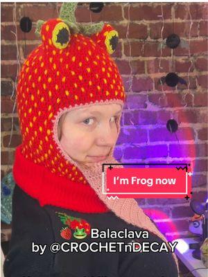 Transforming into a strawberry frog 🍓 . The biggest thank you to @crochetndecay for bringing my vision to life. I’m so impressed by the quality of this hat & could not be happier with it. The FLIES though?! Come on. It’s brilliant!! Constance has the frog balaclava pattern available, so you should go look and show her some love. Leave a frog on her page for me! ♥️🐸🍓🪰 #frogcore #frogsculpture #frogartwork #fruitart #frogparty #strawberryseason #cuteaesthetic 