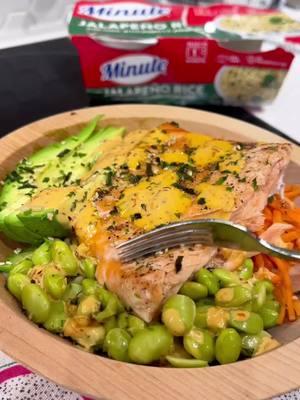 Turn up the flavor with this spicy Salmon Bowl from @makingwithmadison! Made with Minute's Jalapeño Rice Cups, it’s a quick and easy meal that doesn’t skimp on bold, zesty vibes 🔥 Get the recipe below ⬇️ #whatsyourflavorite #minuterice #mealprep To make this salmon bowl, roast your salmon for about 20 minutes at 400˚F until it reaches 145˚F and flakes easily. Serve it with Minute Jalapeño Rice Cups, edamame, carrots, avocado, and spicy mayo.