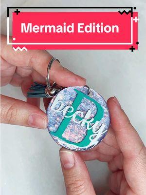 Make a keychain with me! Mermaid Edition #acrylickeychain #resinkeychain #acrylic #resin #resinpour #resinart #smallbusinessowner #supportsmallbusiness #SmallBusiness #smallbusinesscheck #like #tiktok #tiktokmademebuyit #tiktoktrending #trending #fyp #foryou #foryoupage #purple #holographic #white #teal #creative #create #art #artistsoftiktok #sparkle #sparkley #glitter #glitterkeychain #bellalofacreations