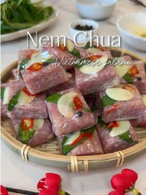 🧧Nem Chua - Raw fermented pork is the ultimate Lunar New Year snack! Perfectly tangy, garlicky, and packed with umami goodness, it’s the perfect Asian salami. → Comment “yum” for the full recipe sent straight to your DMs! 💌 ✨ nem chua is a symbol of good fortune and togetherness for the Lunar New Year holiday. Let’s make 2025 the year of cooking up great food and saving money! Save and share with someone who’d love to try this! ❤️ 🛒 what you’ll need: Meat mixture: * Lean Ground pork: 1 lb * Cooked sliced pork skin: 1 bag * Thai Nam Powder: 1 big pack seasonings and 1 small pack included inside (for curing) * Sugar: 1 heaping tablespoon * Garlic: 1-2 cloves, finely minced * Thai chilies: 2-3, finely minced * Fish sauce: 1 tablespoon * Black peppercorns : 1 tablespoon (optional) Garnish: * Garlic garnish: Thinly sliced * Thai chilies garnish: Thinly sliced * Rau ram (Vietnamese coriander): For garnish * Black peppercorns (optional): For added spice 📝 Notes: • Nem chua requires about 2-3 days to ferment at room temperature. Adjust time based on your climate! • Always use fresh, high-quality lean pork since this is a raw preparation. Lunar New Year, Vietnamese Food, Nem Chua, Fermented Pork, Holiday Recipes, Asian Food, Vietnamese snack #NemChua #LunarNewYear #VietnameseFood #HolidayRecipes #FermentedGoodness #salami 