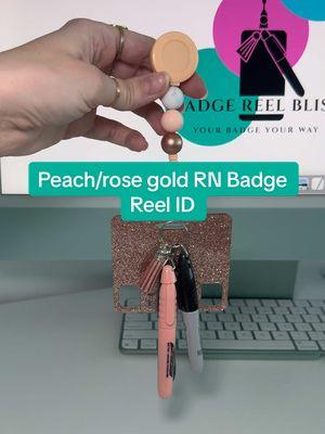 Calling all RN’s and healthcare workers. 🧡 Leave a 🖤 if you like this peach/rose gold RN Badge Reel ID.  #Badgereelbliss #badgereel #peach #rosegold #rn #custombadge #uniquegift #idbadgecard #cute #obsessed #customorder #hospitalgift #customworkbadge #newproducts #SmallBusiness #emergingbusiness #custombadges 