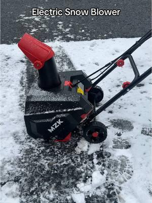 Clearing snow has never been easier! Our new electric snow blower is lightweight, powerful, and perfect for both of us to use. No more back breaking shoveling #SnowBlower #ElectricSnowBlower #WinterEssentials #SnowRemoval #EasyWinter