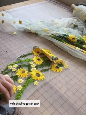 If you are a sunflower girlie, this is the veil for you My "Wild Sunflower" is another veil that will be released next month! I've always been asked about making a sunflower veil, so here we are I am finally making that sunflower veil! #engaged #floralveil #bride #weddingveil #weddingplanning #sunflower #sunflowerwedding #weddingtiktok #weddingtok 