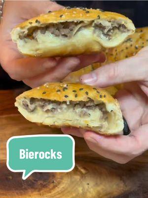 Bierocks- The Ultimate German Appetizer 🔥 Beirocks *Makes 16 bierocks Ingredients: 2 pillsbury pizza dough packages 1/2 yellow onion diced 1# ground beef 8 to 10 oz Gruyère cheese  Salt Pepper Garlic powder Cayenne 1 egg 1 tablespoon milk Sesame seed blend 1 can sauerkraut (14.5oz) Method- Sauté your onions for about 8 minutes, add your beef and break it up. Add salt, pepper, garlic, cayenne and cook until beef is cooked through. Taste for salt.  Open your pizza dough and on a floured surface, press it down so it’s even and cut into 8 squares. Add a bit of Gruyère on the bottom, meat and sauerkraut mix and more cheese and then fold each flap over and pinch well so it doesn’t open while it’s cooking. Repeat the process with the rest and then line a baking sheet with parchment paper, spray with olive oil and arrange the bierocks on them. Beat the egg and milk and brush each one and then sprinkle sesame seeds and a pinch of salt and bake on 325 for 25 mins. #fy #foru #germanfood #bierocks #appetizers #tiktokfood #cheesy #creatorsearchinsights 