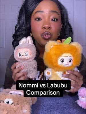 Let’s compare Labubu and Nommi to See which ones are a better choice they both are so adorable but they have there pros and cons 🤭✨ #nommiblindbox #labubublindbox #blindbox #labubuthemonsters #labubumacarons #nommi #nommiv1 #nommiv3 #nommidoll #arttoy #popmart #plush #plushcharm #bagcharm 