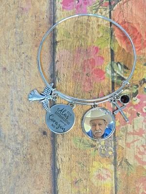 may he rest in peace sending my love and prayers.  if you'd like to order a photo charm bracelet, they are available in the orange shopping cart. once you place your order. you can see my pinned video for how to send photos. ❤️ #memorialgift #inmemory #wemissyou #alwaysrember #wemissyou #tiktokshopblackfriday #meaningfulgifts #holidayhauls #memorial #memory ##charmbracelet #giftsforher 