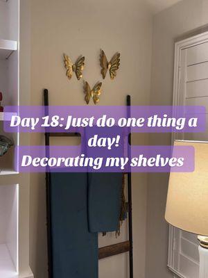 Day 18: Just do one thing a day! Getting the house back in order after Christmas by decorating my shelves in the living room with the normal decor.  #shelfstyling #justdoonethingaday #homeorganization #comfortcreator #decoratewithme #homedecortiktok 