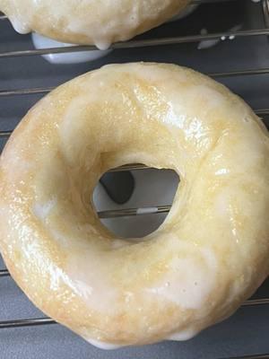 Glazed Cake Donuts 🤍 Cake Donut * 2 cups all purpose flour * 2 tsp baking powder * 1/2 tsp salt * 1/3 cup white granulated sugar * 2 large eggs * 1/3 cup vegetable oil * 2 1/2 tsp vanilla extract  * 2/3 cup milk Glaze * 1 1/4 cup powdered sugar * 1/4 cup milk Bake Temperature: 350F Bake Time: 10-11 minutes 1. Preheat oven to 350F. 2. To a bowl add flour, baking powder, and salt. Mix to combine. 3. Add milk, vegetable oil, vanilla extract, white sugar, and eggs. Mix until your batter comes together. 4. Spray your donut pans with nonstick spray or whatever you prefer.  5. I used a piping bag to fill donut pans. Fill all 12. 6. Bake at 350F for 10-11 minutes. 7. Take out of oven and let cool in pan for about 5 minutes. After cooling in pan, add to wired rack to cool for another 5 minutes. 8. To make your glaze, mix together your powdered sugar and milk. 9. Take each donut, dip and coat in glaze. 10. Place back on wired rack so excess glaze drips off donuts. 11. Dive into these moist glazed cake donuts that will cure your donut craving! #cakedonuts #cakedonut #donutrecipe #doughnuts #desserttiktok #bakingtiktok #zeetheintrovert 