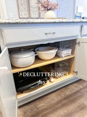 Decluttered the other set of cabinets in our kitchen island! I can’t tell you how good this feels already! Being able to open a cabinet to get out what I need and not having to worry about things falling out at me is so nice. And actually having a home for everything so I can put things away so easily- the best! I really liked adding these acrylic drawers under here to make use of the vertical space a little more. And I finally have a good place to store my sourdough supplies.  A handful of my kitchen cabinets are still in good shape from my last declutter, but I listed out all the ones that need some work again and I’m going to keep moving through them every day! I’m planning to do my tupperware cabinet tomorrow- I’m so excited to get that one done! #declutter #decluttering #declutteringtips #howtodeclutter #declutteryourlife #organizewithme #cleanwithme #declutterwithme #kitchendeclutter #kitchenorganization #organizedhome #homeorganization #declutteringformentalhealth #momlife 