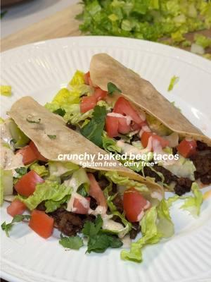 crunchy baked beef tacos 🌮🍅🥬 recipe below!  INGREDIENTS:  - 1 medium sized white onion  - 1 pound of ground beef  - 7-8 Tortillas (I’m using @Siete Foods )  - Olive oil for cooking  - 3-4 cloves garlic (minced)  - 1/2 tsp ground cumin  - 1/2 tsp onion powder  - 1/2 tsp oregano  - 1/2 tsp smoked paprika  - 1/2 tsp chili powder  - 1 tbsp tomato paste  - salt + pepper  CHIPOTLE CREMA:  - 2-3 tbsps sour cream (I’m using dairy free @Forager Project)  - 1/4 tsp chipotle powder - Splash of water *you can also add lime juice if you wanna get crazy with it !!  TOPPINGS: (whatever your heart desires)   - Diced Roma tomato  - Shredded lettuce  - Cilantro  - Chipotle crema (listed above)  INSTRUCTIONS:  - Start by preheating your oven to 400. - Dice your white onion, set aside for now.  - In a skillet over medium heat, add a splash of olive oil. Add in your diced onion and stir until just softened (2-3 minutes)  - Add your ground beef into the same pan. Break it up til it’s brown you know the drill.  - Once it’s about halfway browned, season generously with salt and pepper. Add in your minced garlic. Mix mix mix  - Then add your cumin, onion powder, oregano, smoked paprika, chili powder and tomato paste. Mix mix mix  - When the meat is fully browned and the seasonings are well combined, remove from heat, cover and set aside for now.  - In a small skillet over medium heat, add a splash of olive oil. Heat up your tortillas about 20-30 seconds per side, or until they are fully softened. - Line your pan with parchment paper, add your tortilla to the pan, fill with our meat mixture. Then fold tortilla over and press down ~5 seconds. Repeat that until you run out of tortillas and meat.  - Then pop em in the oven for 10-12 minutes.  - While those bake, I prepped all my toppings. Shredded my romaine lettuce, diced my tomato and prepped my crema (recipe above).  - Then remove from oven and allow it to cool 3-4 minutes.  - Then it’s time to plate!! 🍽️  - I added all of my toppings, drizzled with my chipotle crema and enjoy !!!!!  Recipe inspired by @The Defined Dish with my own little twists 🩷 @Caraway Home @H-E-B @Central Market #bakedtacos #easytacos #sheetpandinner #easydinner #weeknightdinner #healthyrecipes #healthydinner #dinnerfortwo #recipesoftiktok #dairyfreerecipes #glutenfreerecipes #glutenfreedairyfree  