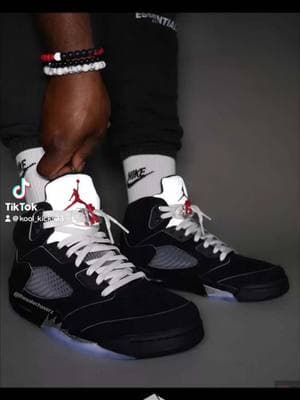 The Air Jordan 5 Retro OG 'Metallic Reimagined' brings back a black nubuck upper with molded TPU eyelets, quarter panel netting and reflective piping. Additional 3M reflective accents appear on the padded tongue, marked with a crimson Jumpman logo, and the raised Nike Air branding that decorates the back heel. The sneaker is mounted on a black polyurethane midsole, featuring metallic silver shark tooth detailing and a visible Air-sole unit in the heel. A translucent rubber outsole provides durable traction underfoot. #koolkicks 