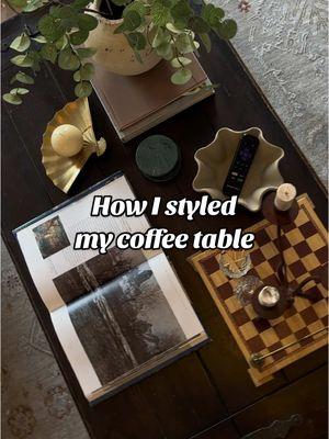 Thrifted vs styled- coffee table edition! I love how I was able to put together a beautiful display on my coffee table that adds elements of my personality and what I like! Let me know what you guys think? And should I keep the fan? ##coffeetablestyling##coffeetable##nyapartments##thriftedvstyled##repurpose##morethenonething##thrift##thrifted##thrifttok##decorideas##genzdecor##decorideas##vintage##DIY##decor##20something##secondhandshop##affordable##creativ##creativestyle##styling##thriftedvsstyled##homedecortiktok##thriftedfinds##thingsarentwhattheyseem