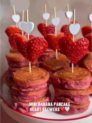 If you need a breakfast or brunch idea for your Valentine’s or Galentine’s day, make these mini banana pancake heart skewers❤️Super easy to make and oh so yummy.  Save for later and follow along for more festive eats! Here is how to make them: 1. Cut 2 bananas into 1 inch thick coins 2. Prepare your pancake batter according to package.  I used @Birch Benders paleo mix and added 1 Tbsp beet root powder to give it the reddish pink natural food coloring 3. Dip each coin in the pancake mixture 4. Add 2 Tbsp vanilla bean ghee or any oil you like to a pan on medium heat and warm through  5. Add banana coins to pan and cook a couple minutes each side 6. Using a mini cookie cutter, cut out heart shaped strawberries 7. Add a strawberry to a 4 inch heart skewer 8. And poke skewer into 3 of the mini pancakes. Enjoy! . . #valentinesbreakfast #galentinesbrunch #valentinesbrunch #valentinefood #valentinesfood #galentinesparty #bananapancakes #bananapancake #paleopancakes #festivefoods #valentinesparty #pancakestack #pancakesunday #pancakebreakfast