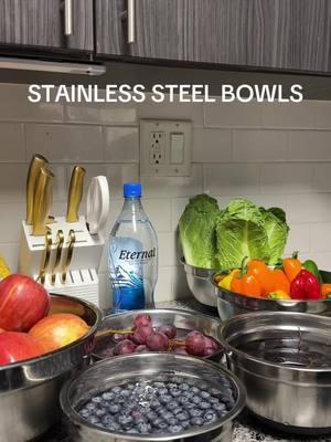 Replace the plastic bowls in your house with these stainless steel bowls. They have a silicone bottom to help prevent slipping and they come with lids.  #iamnilsa #stainlesssteel #kitchen #bowls #tiktokshoo #adoteumhabitinho 