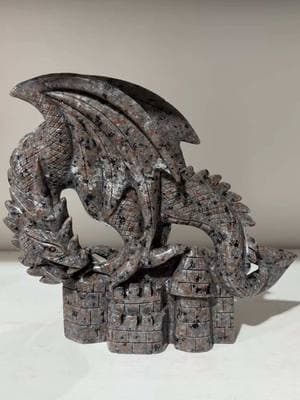 Yooperlite flying dragon on castle #crystal #crystals #crystalshop #crystalcollection #crystalhealing #raws #carvings #carving #flyingdragons #yooperlite 