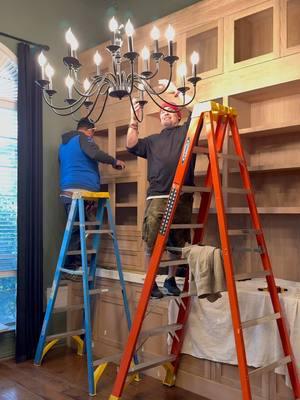 We were all holding our breath 😂🪜 💡  @@THE CASA CUSTOM RENOVATIONS I never had a doubt it was going to work 😂😂😂 ##Ladder##RollingLadder##Lighting##DiningroomMakeover##DiningroomBuiltin ##CustomBuiltin##HoldYourBreath##SaidALittlePrayer 