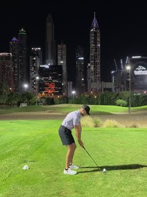 Night golf in Dubai at Emirates Golf Club! We played on The Faldo Course #honeymoon #dubaihoneymoon #nightgolf #emirates #emiratesgolfclub #dubai #traveltiktok #golf #golftiktok 