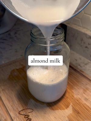 Making almond milk is so much easier than I could have imagined and I am so glad that I finally gave it a try! 🤎✨ This turned out so creamy and I loved the flavor! I am including everything I did below, but let me know any tips or tricks you have 😊 Ingredients: -1 c almonds unroasted/ unsalted almonds -2 c water for every 1 c of soaked almonds -sea salt -maple syrup 1. Soak almonds in water overnight 2. Add 1 c of almonds, salt & maple syrup to a blender with 2 cups of water and blend for 45 seconds to 1 minute 3. Drape a cheese cloth over a bowl and carefully pour blended mixture into cloth 4. Slowly drain cheese cloth into bowl squeezing any liquid out of the mixture 5. Store in fridge for up to 5 days #almondmilk #almondmilkrecipe #easyalmondmilkrecipe #easyalmondmilk #organicalmondmilk #almondmom #almonds #coopskitchen #betterathome #healthyalmondmilk #CapCut