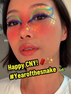 🐍✨ This #yearofthesnake, celebrate bold transformations, strength, & unapologetic creativity 🔥🫶 #chinesenewyear #cny #springfestival #epiphanyglow #Eyeliner #creativemakeup #makeupinspo #colorfulmakeup #graphiceyeliner #makeuptok #GlowUp #kaleidosmakeup #beauty #tiktok #fyp 