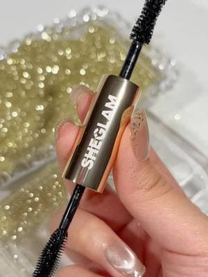 We're going for the gold 🎖️ This 2-in-1 formula defines and volumizes lashes while delivering multi-dimensional effects for full-bodied, sky-high lashes that last! 😍 Shop yours now at SHEGLAM.com🛍️🛒 (ID: 53930983) #mascara#longlashes#viralmakeup#blackmascara#fyp#newdrops#sheglammascara#sheglamallinone#sheglam24Kgold#sheglam#sheglamcruetlyfree